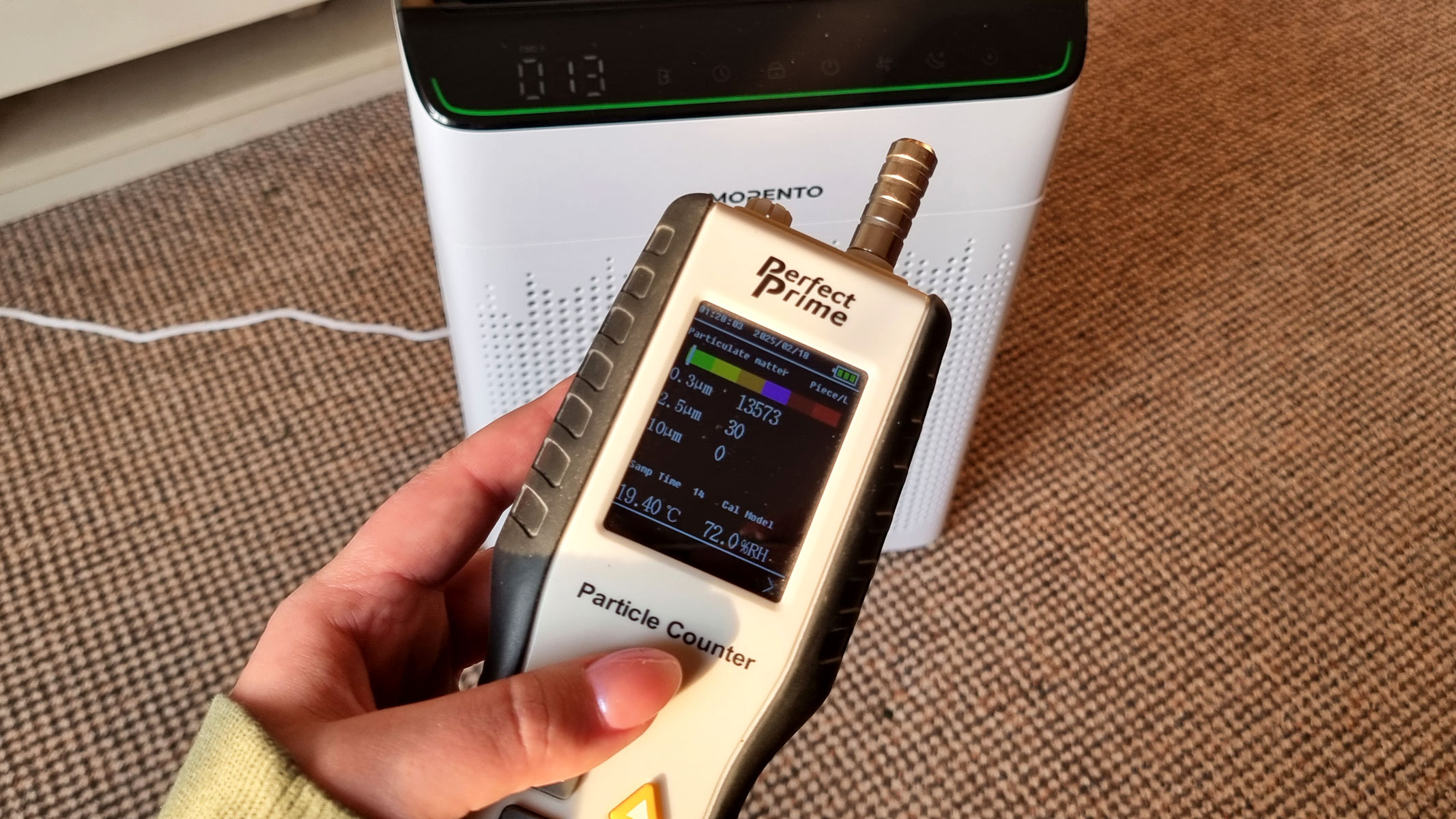 Morento MR5866 Smart Air Purifier being tested by our reviewer